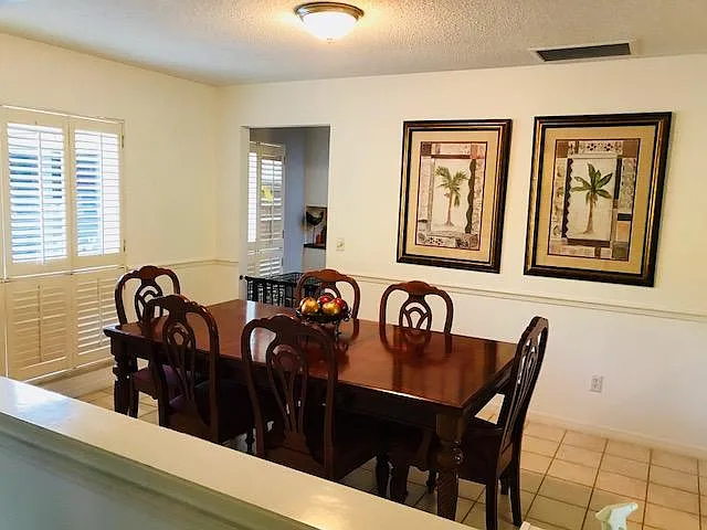 Dining room leads to kitchen