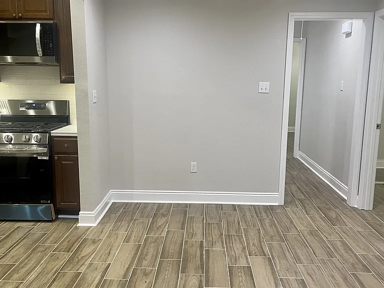 Convenient dining area situated between the kitchen and living space, perfect for meals and gatherings.