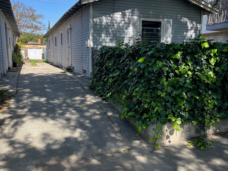 Front of Duplex with fromt yard