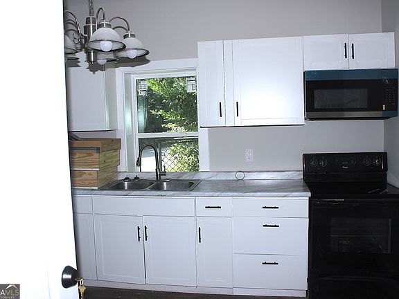 4th image of 3937 Log Cabin Dr