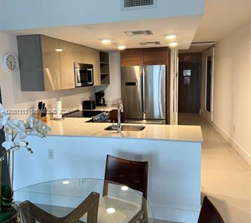 1st image of 9261 E Bay Harbor Dr #Cu-403