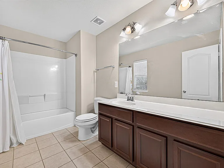 9106 Fuqua Breeze Dr — Photo 27