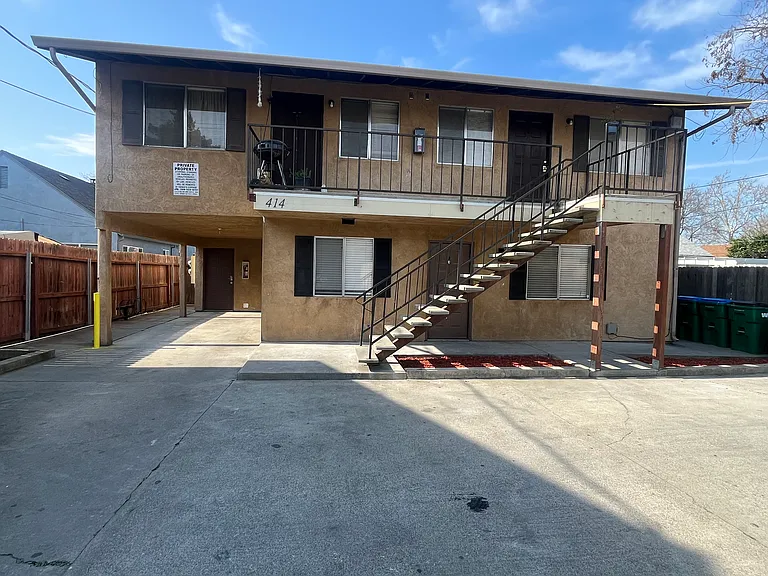 Exterior with 1 covered parking & 1 uncovered parking