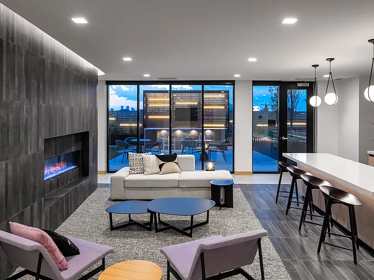 3rd Floor Lounge with kitchen and fireplace