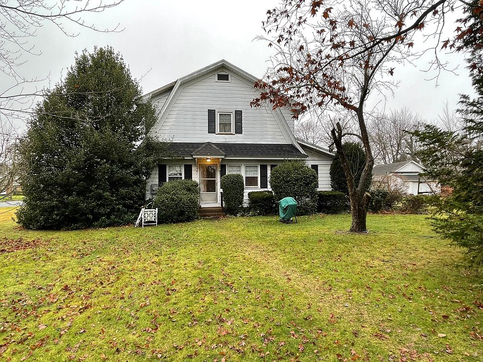 Private side entrance with outdoor living space.