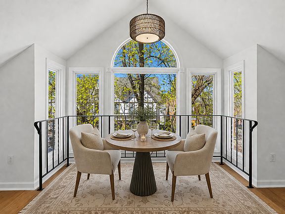 Dining area @ picture window, virtually staged