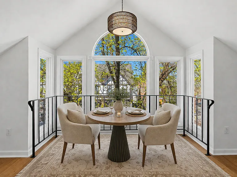 Dining area @ picture window, virtually staged