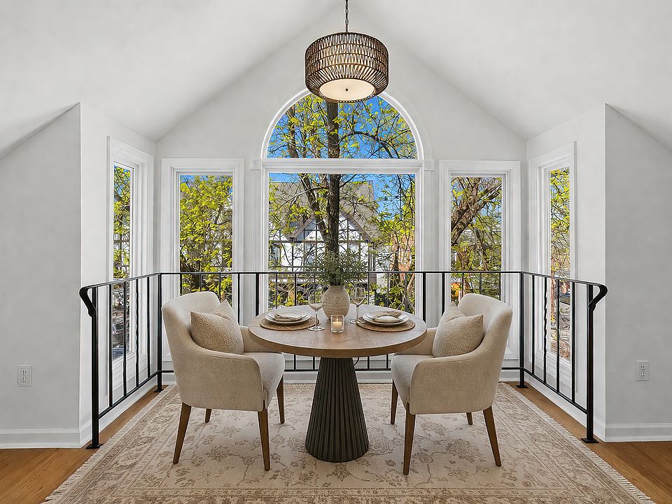 Dining area @ picture window, virtually staged