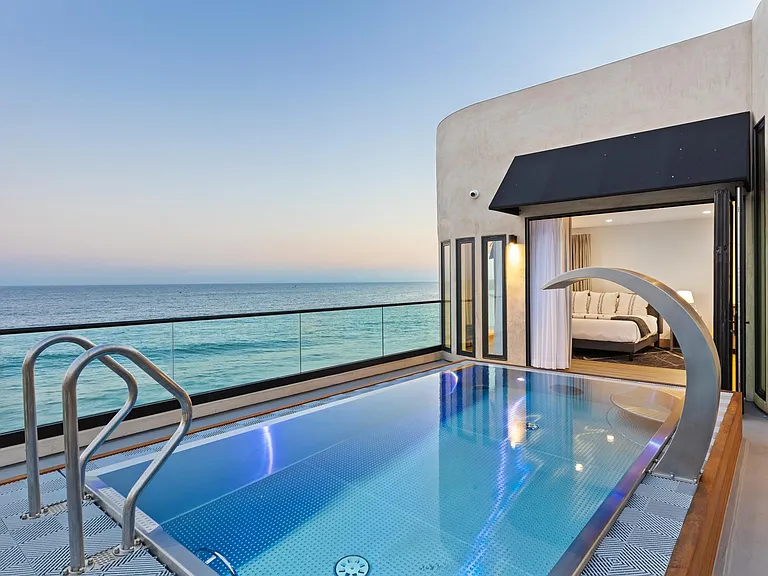 Pour a glass of wine and let the waves take you away.
