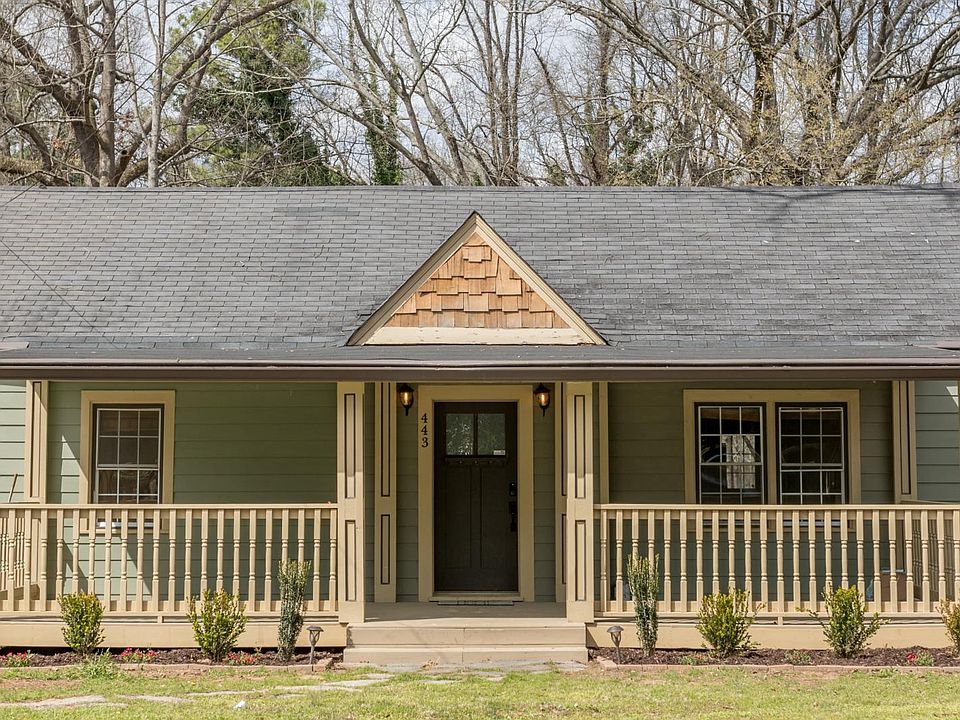 Freshly landscaped! Large covered front porch!