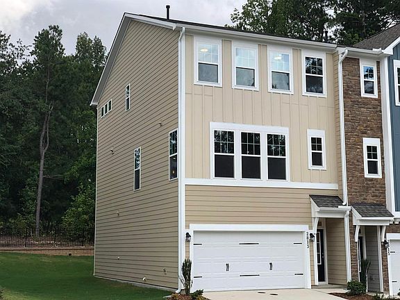 exterior-end unit backed with trees