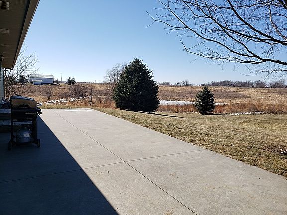 Neighboring pond & hay field