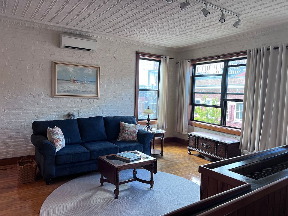 Sunny living room on Fore Street side