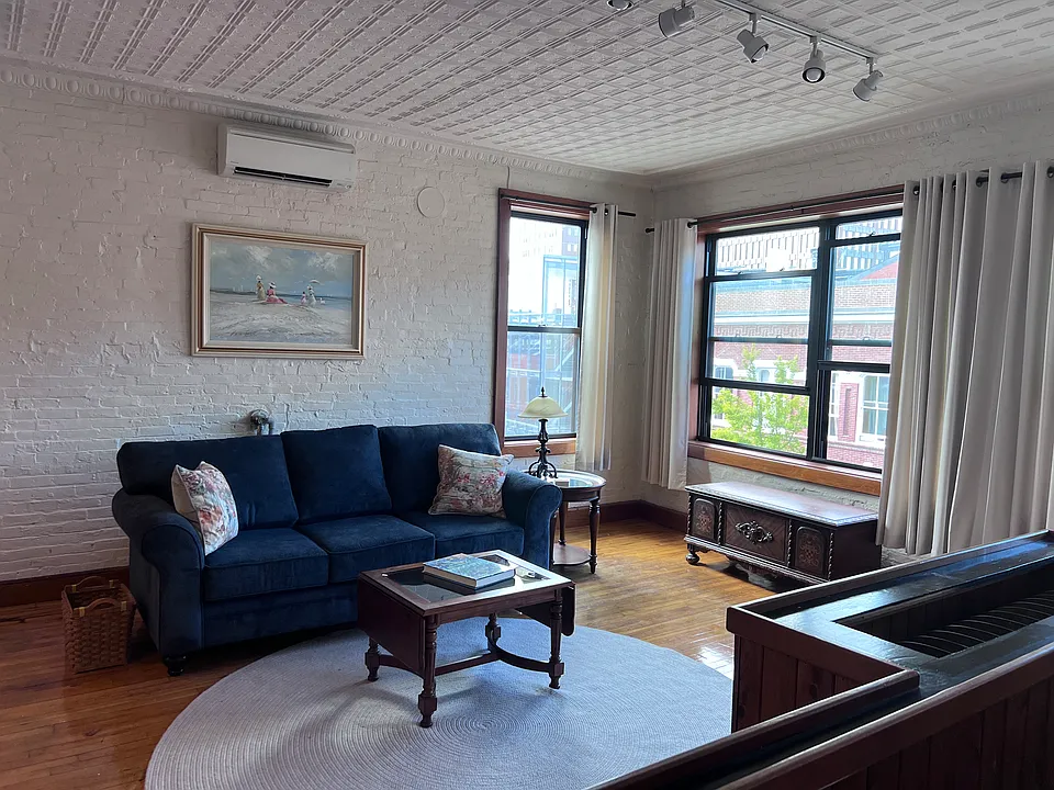 Sunny living room on Fore Street side