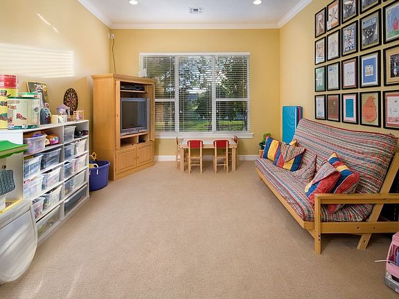 First floor media room with wet bar in addition to 2nd floor bonus retreat!