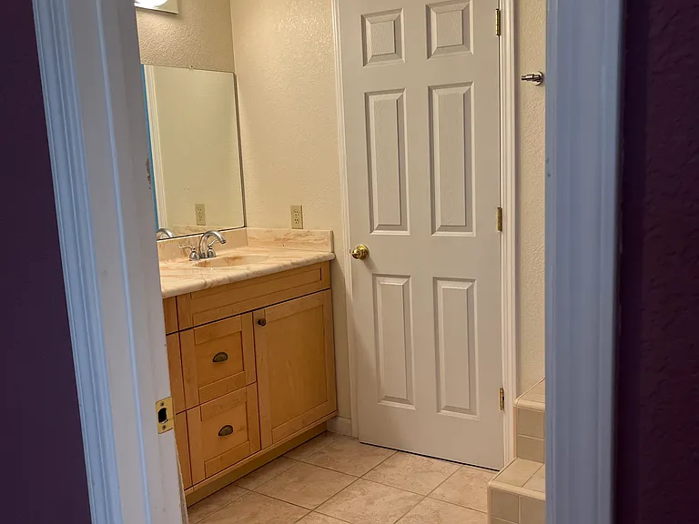 Master bedroom bath has a separate toilet room