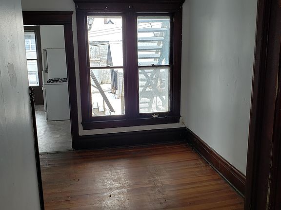 Dinning room, hardwood floor& woodwork , lot of natural light