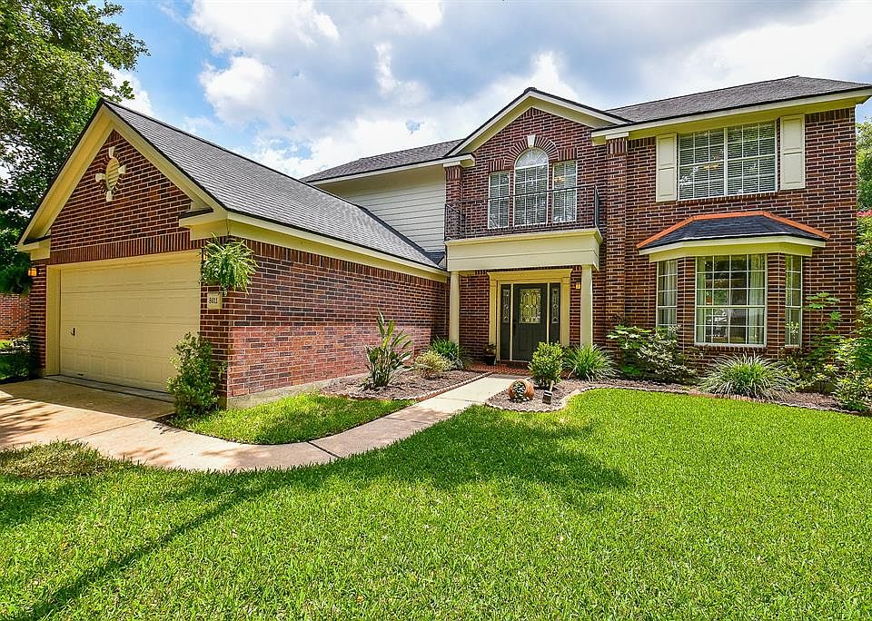 Located on a tree-lined street, this home is ready for its new owners. The inviting entry with Juliet balcony and adjacent bay window add a bit of character to the exterior of this charming home.