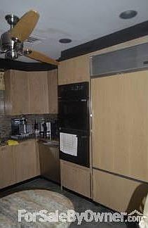 Kitchen
						:
						Wood cabinets,granite counter top/ back splash
premium appliances
