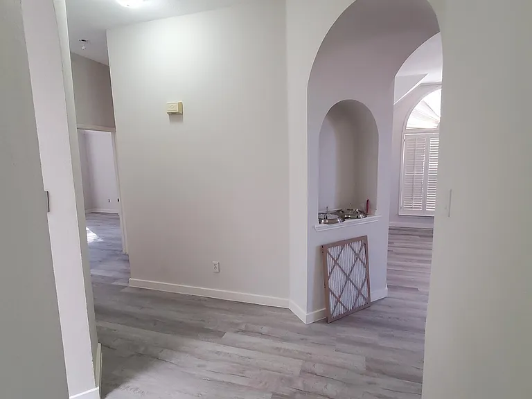 Walkway to the rooms and Kitchen