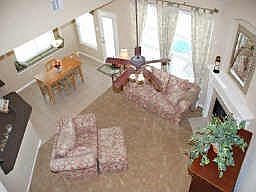 Aerial View of the Family Room Highlighting the Open Floor Plan into the Kitchen &amp; Breakfast Roo