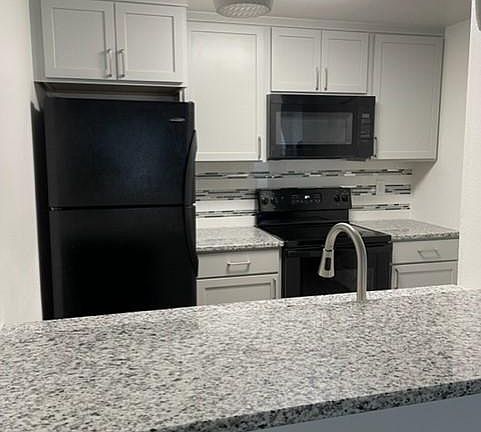 3rd image of 6004 E 6th Ave APT V11