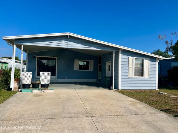 506 Royal Tern Dr, Barefoot Bay, FL 32976