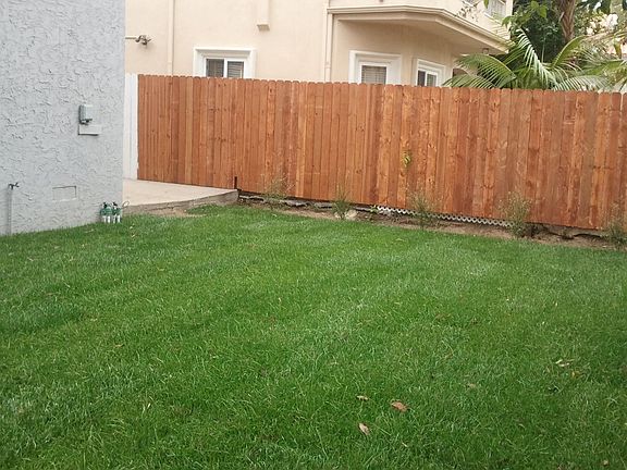 Fenced  yard will be white