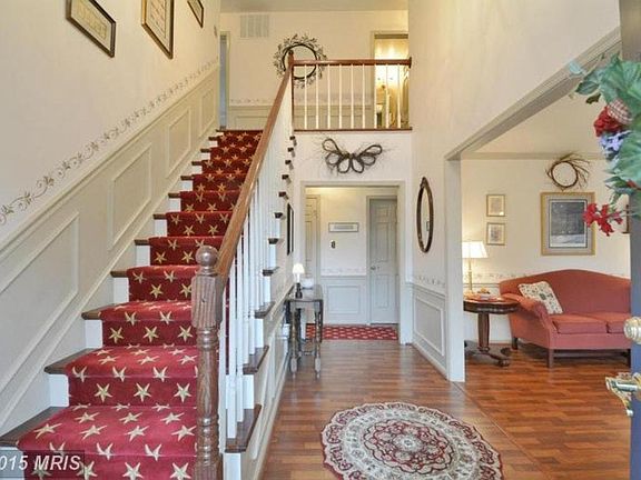 opening front door, entryway. Left is dining room, Right is