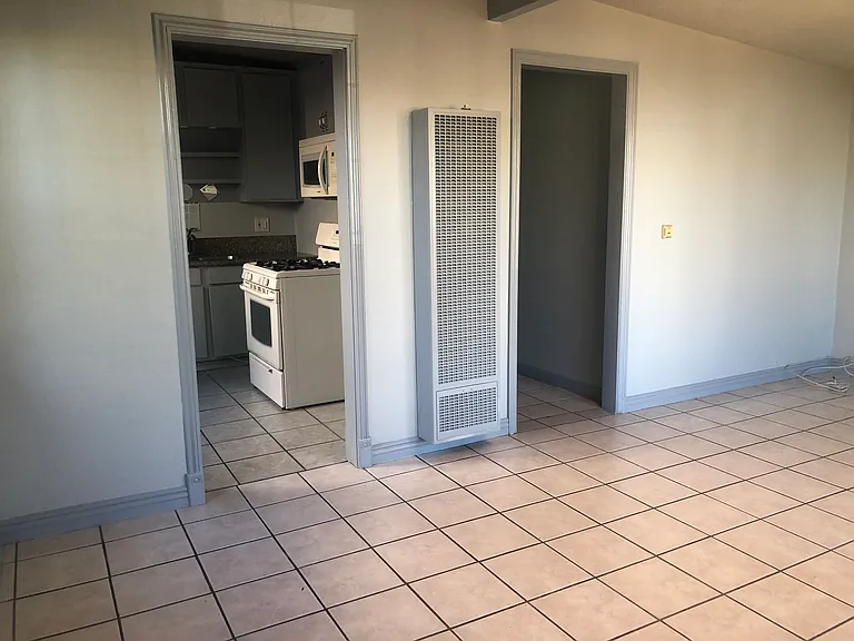 dining/living room. Kitchen and hallway door