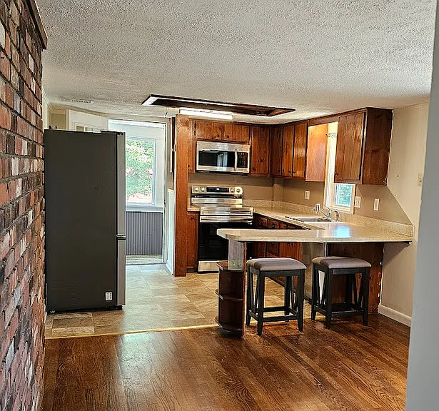 Actual view of the open floor plan kitchen/dining room.