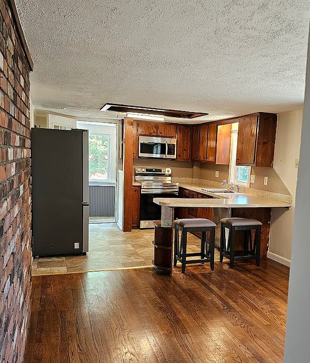 Actual view of the open floor plan kitchen/dining room.