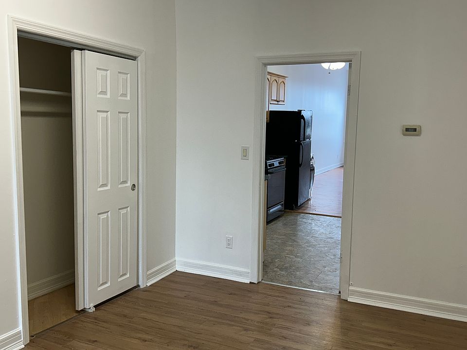 bedroom looking onto kitchen
