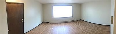 This unit now has carpet in the living room area