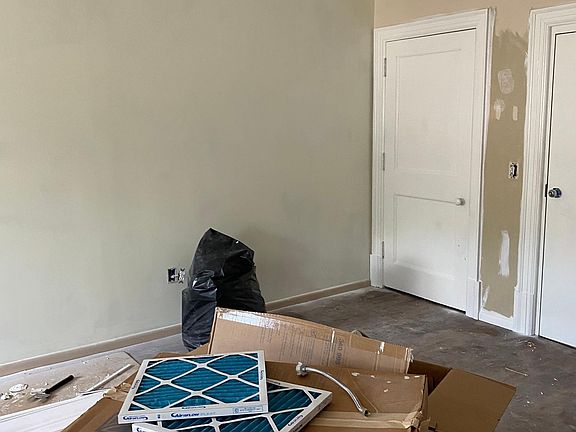 Possible dining area across from kitchen.