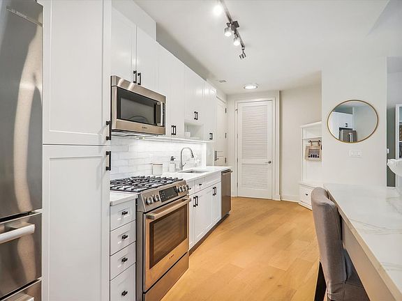 2nd image of 6803 Cameron Dr NW Penthouse 1