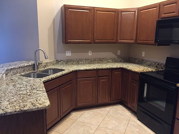 Kitchen showing granite 