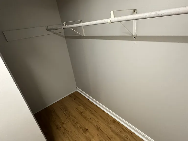 Living room / under stairs storage coat closet