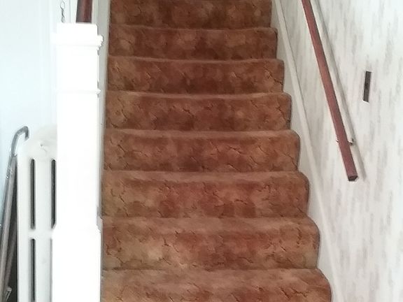 Don't worry. Carpet is gone.