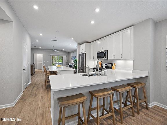 5th image of 214 DAHLIA FALLS Drive