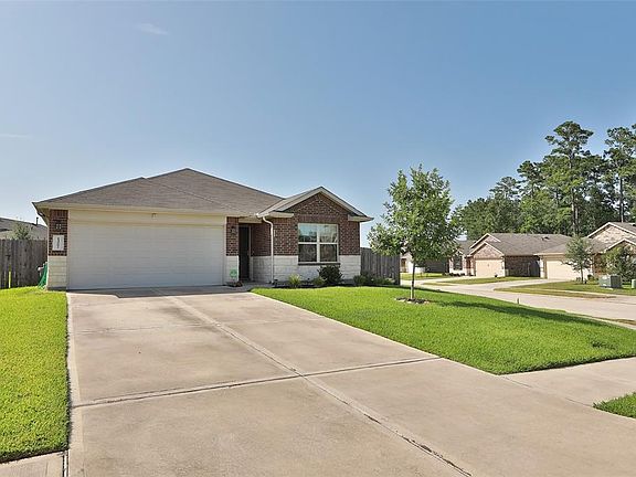 Two car width driveway leading to the garage for ease of parking.