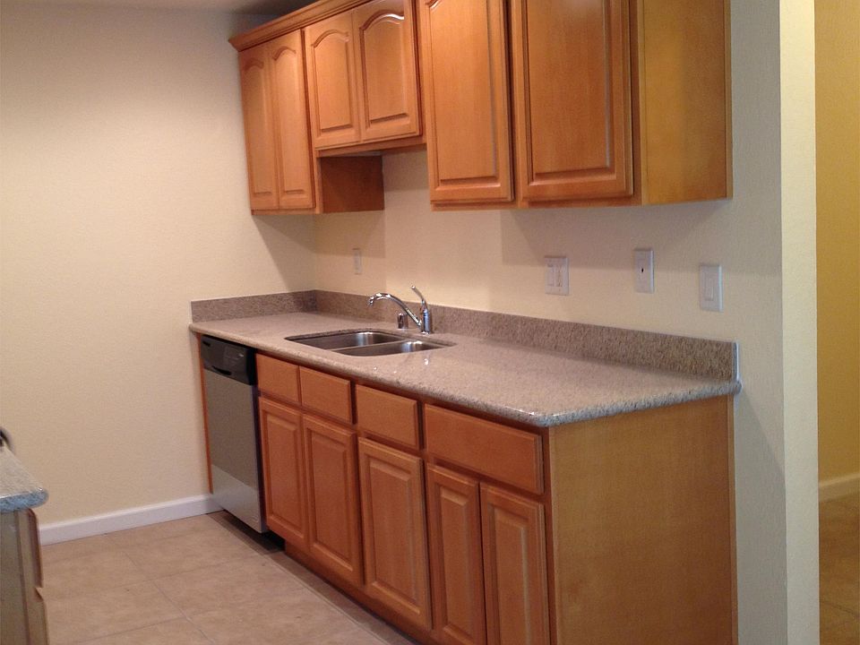 New Granite & Stainless Steel Kitchen. Recessed lighting, Porcelain Tile, Smooth Top Whirlpool range