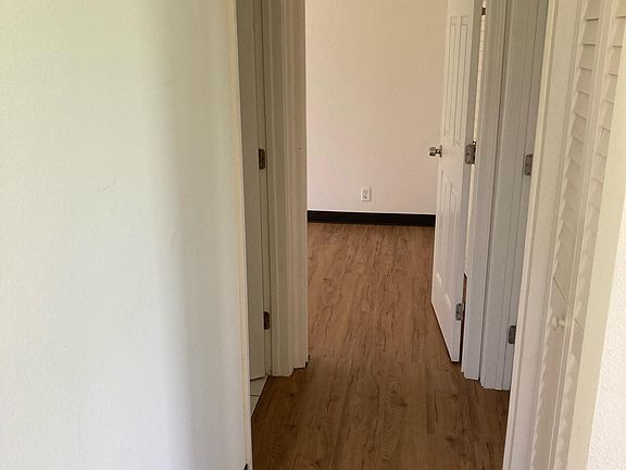 Hallway to bedrooms and bathroom