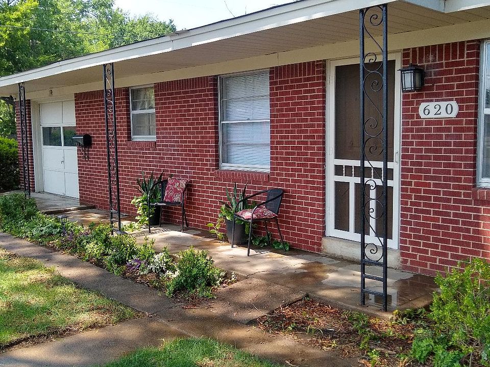 Front of home with front porch cover.