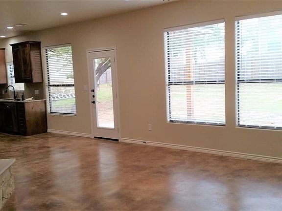 Open plan with concrete floors