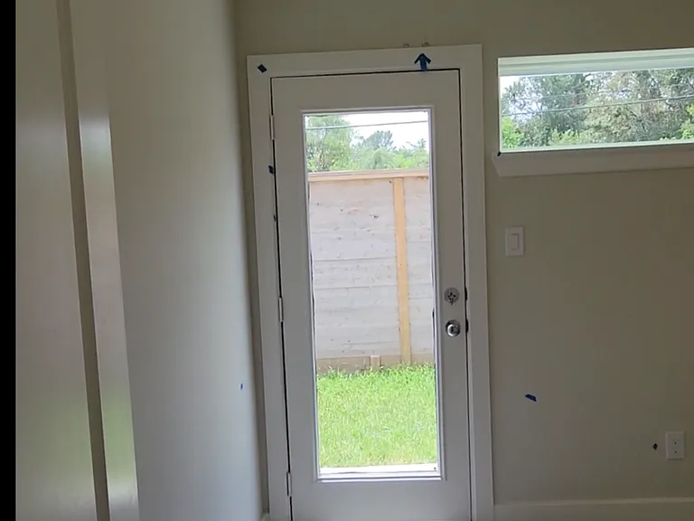 bedroom leads to backyard