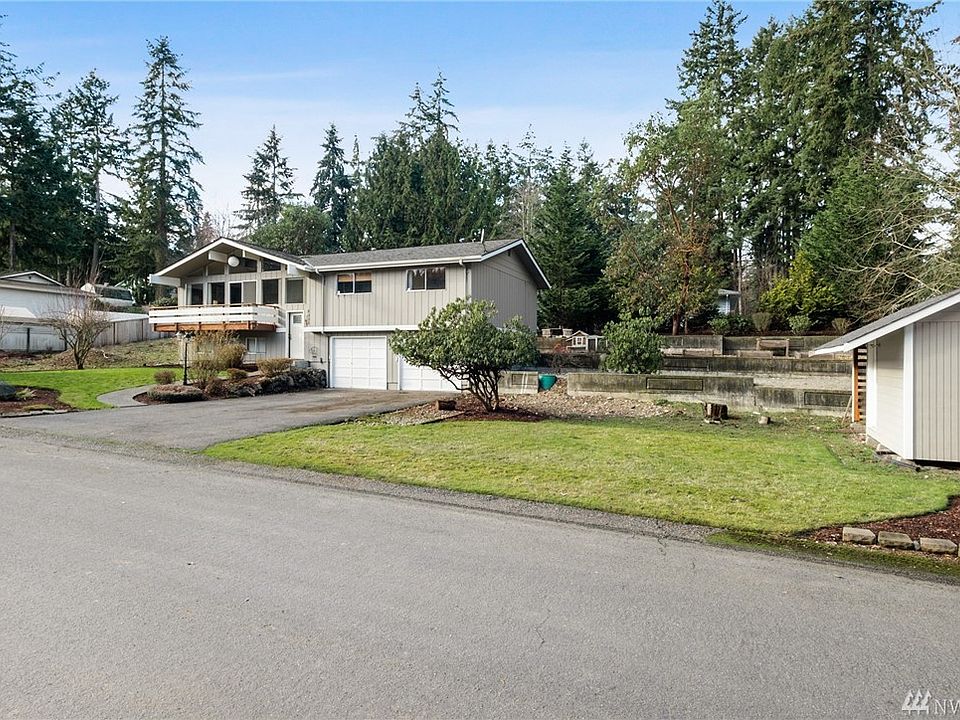 Finally... spread out and have some space! Huge shy 1/2 acre corner lot has abundant areas for parking, play and gardening. Coordinating shed ready to provide extra storage space. 