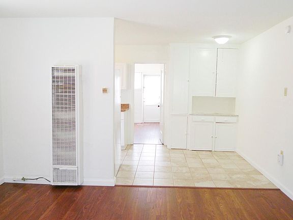 Dining/Living Room (stock photos of similar unit; available unit has carpet in the bedroom)
