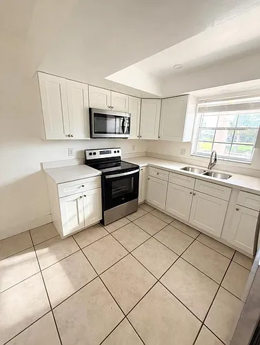 1017 NW 30th Ct #5 Photo 1