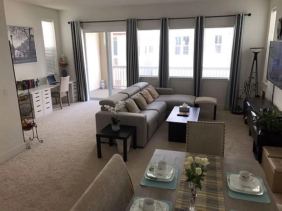 10 foot high ceiling. living, dining, study combo